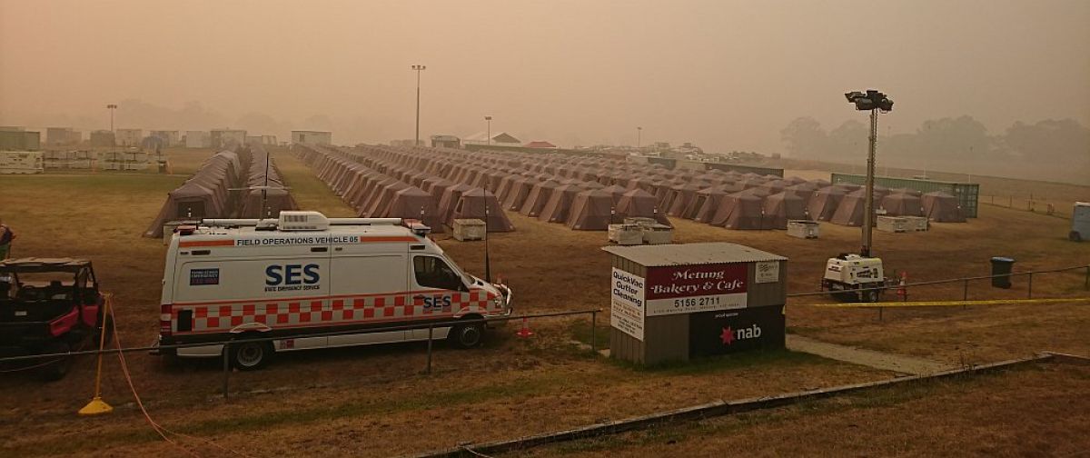Buchan Nowa Nowa deployment base camp with tents in neat rows and SES vehicle in foreground