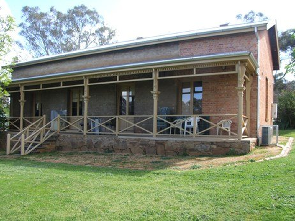 Stone building in the grass