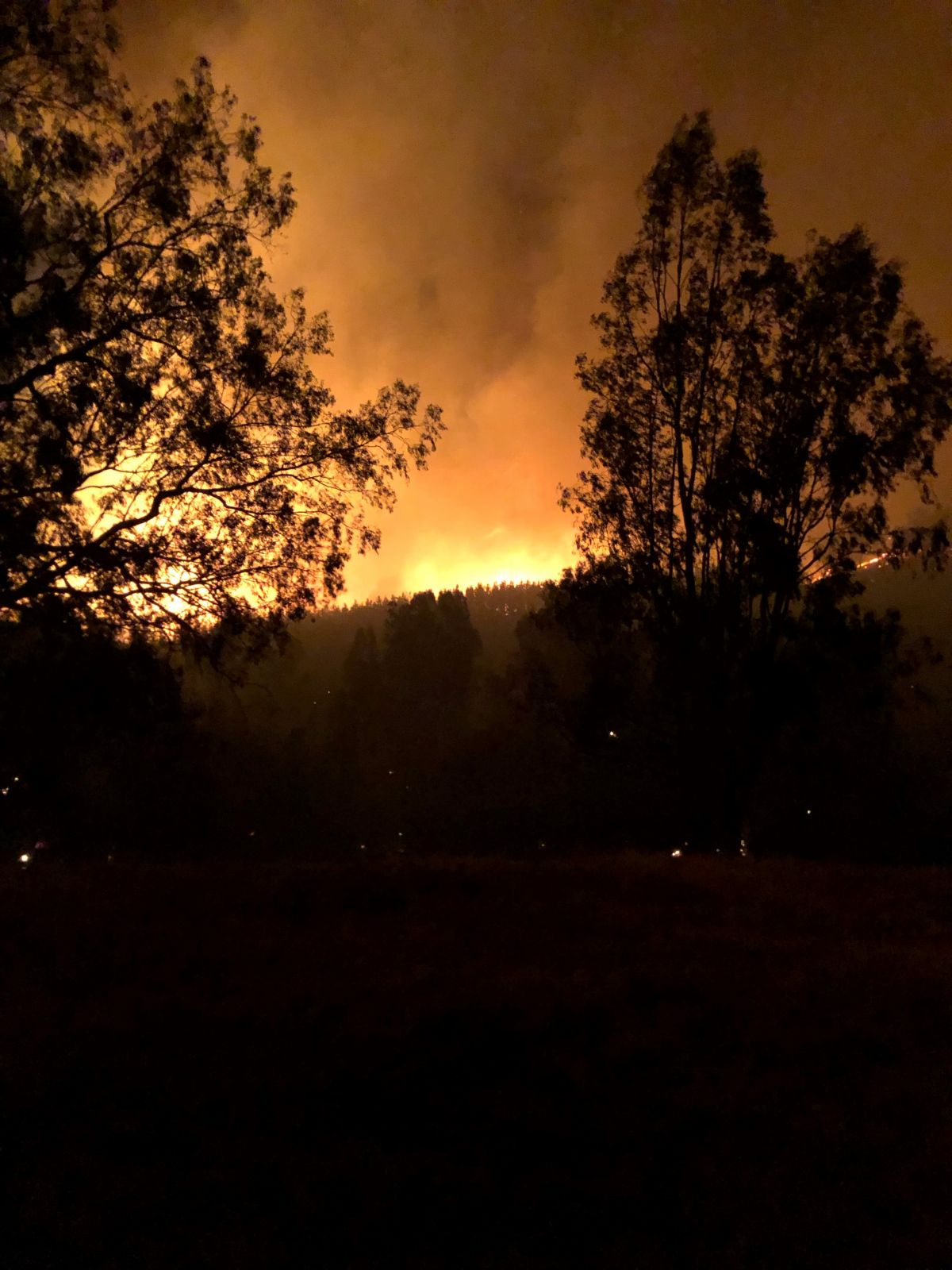 Walwa fire well alight at night