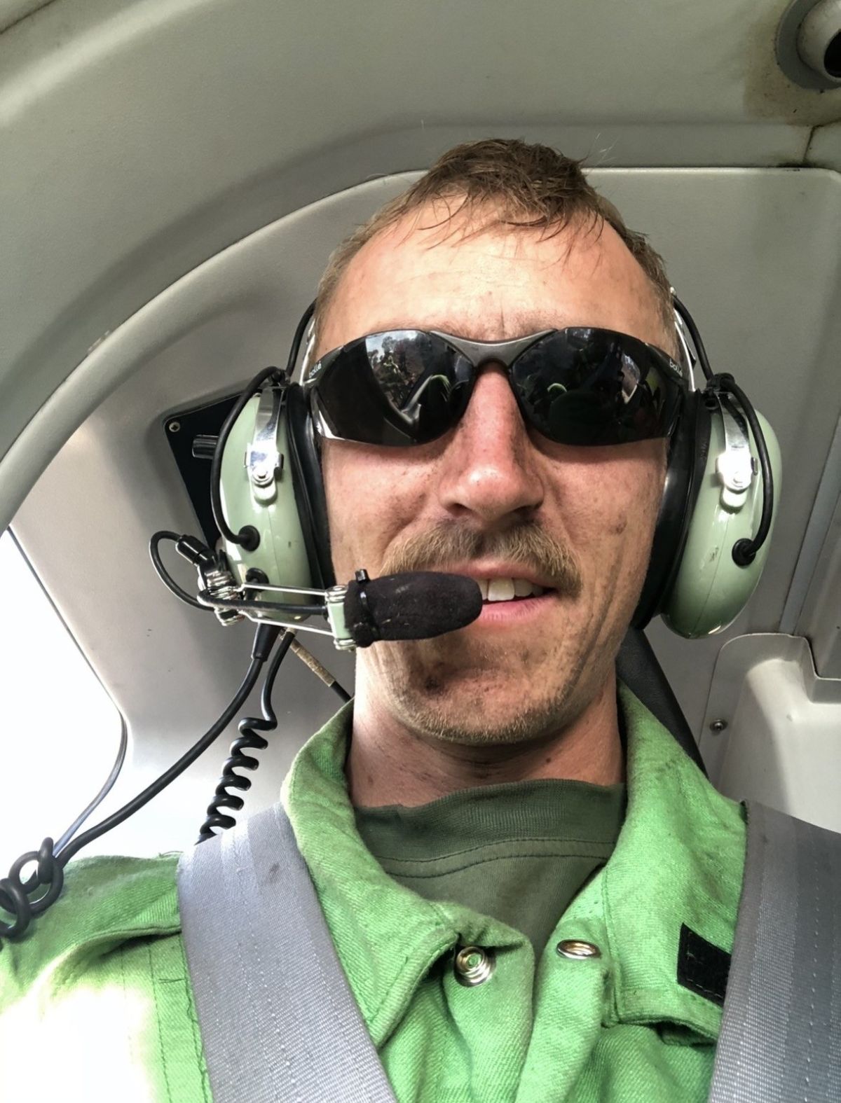 Mitch in a helicopter