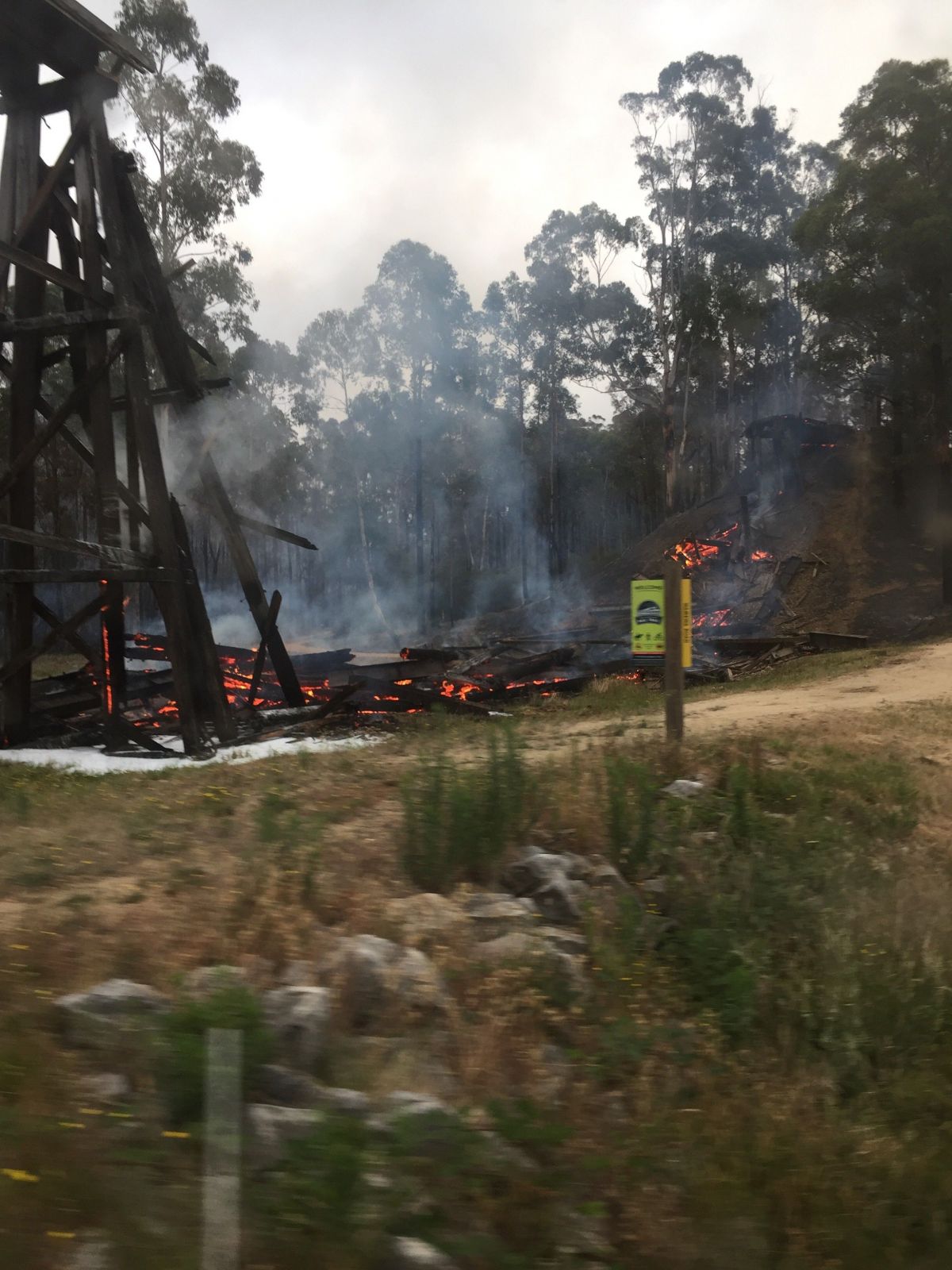 Bairnsdale trestle bridge surrounded by fire