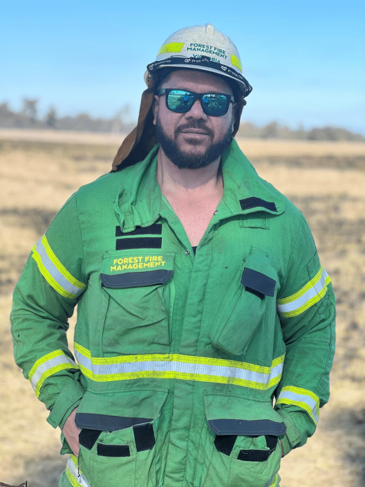 Jackson Hannah, Cultural Burn Officer in FFM uniform outside 