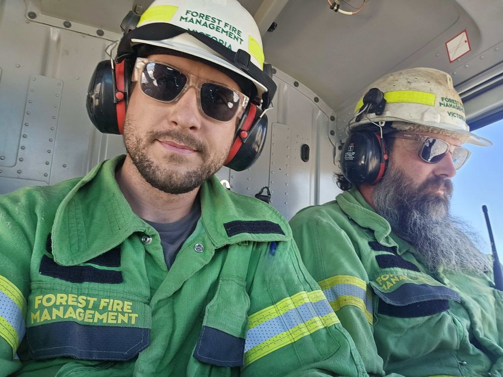 Erwin with his colleague Bronson in a helicopter