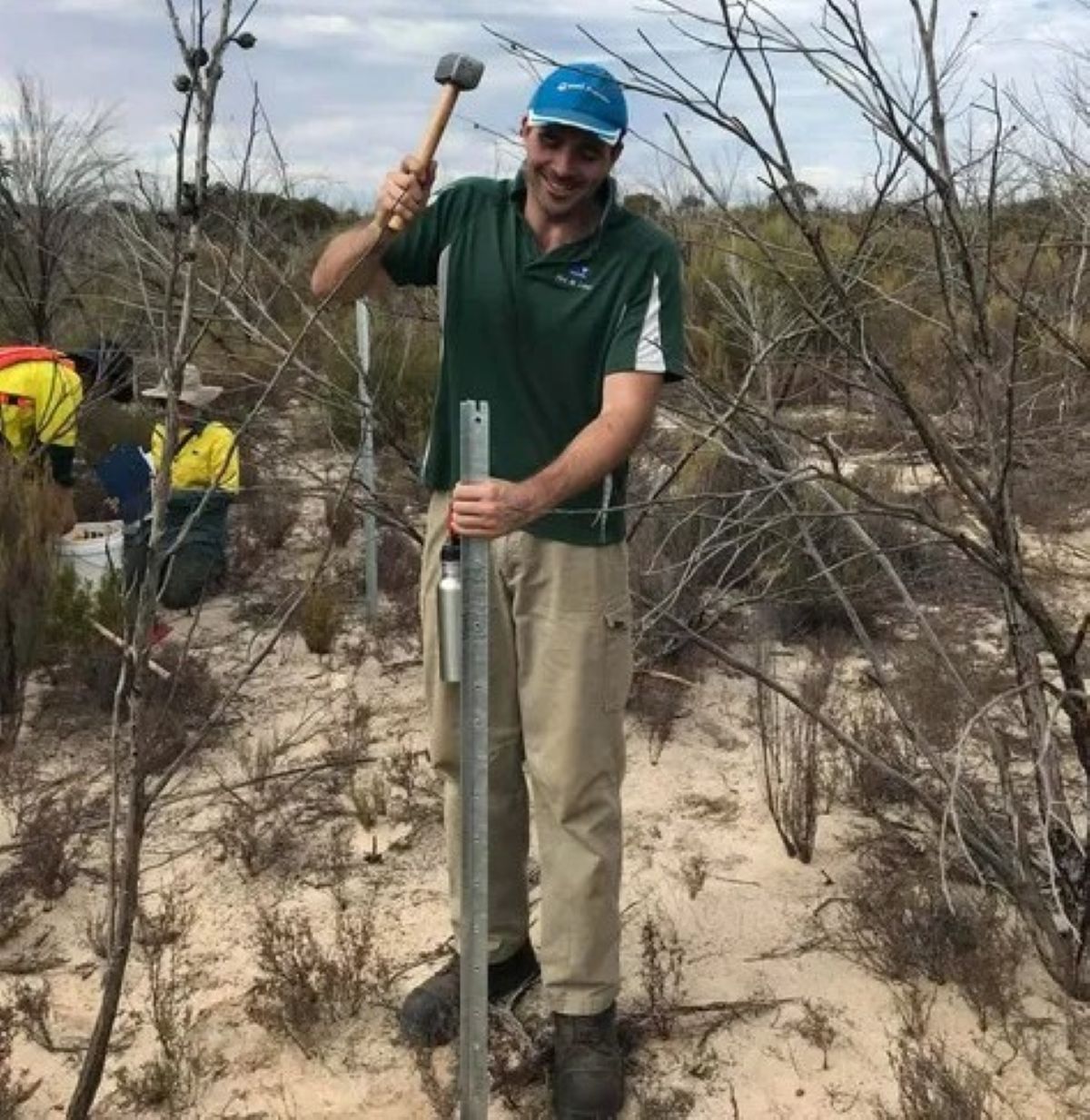 Phil installing a fence