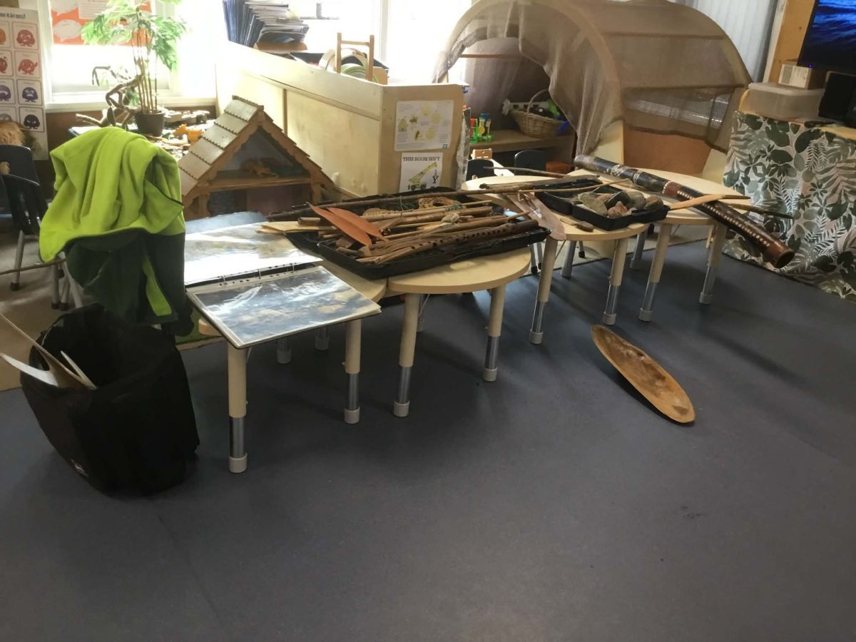 Aboriginal artefacts on a table in a classroom